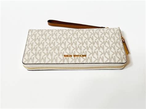 logo continental wristlet michael kors|Michael Kors continental wallet logo.